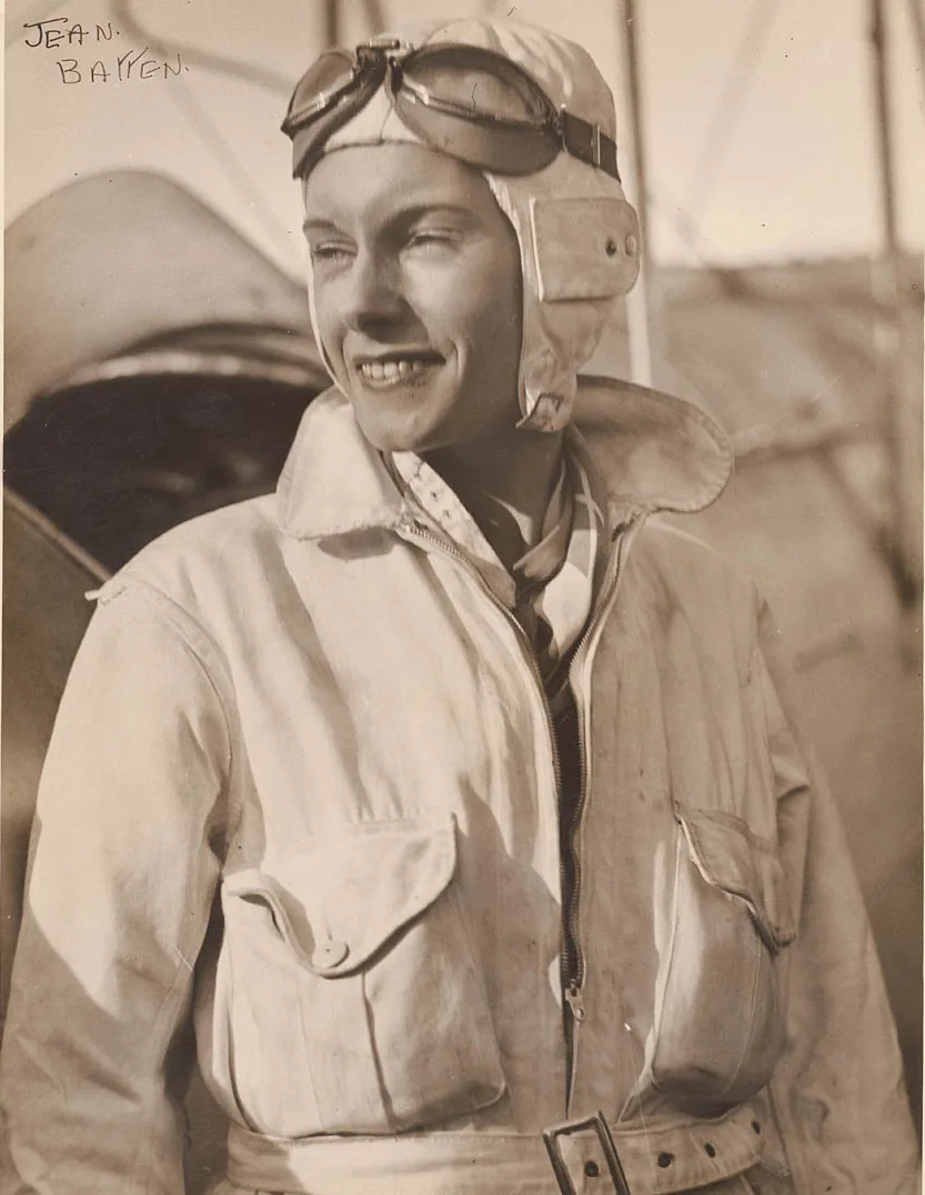 Portrait of aviator Jean Batten in flying gear after her successful England to Australia flight, Mascot, Sydney, 30 May 1934, Sam Hood, from vintage gelatin silver print, State Library of New South Wales, PXE 789 (v.6)