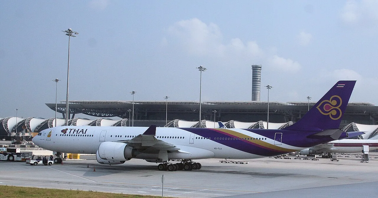 Thai Airbus A340 (HS-TLA) at Bangkok Suvarnabhumi airport (pronunciation: Soo-wanna-poom) which is Thailand's impressive new airport, boasting the world's tallest control tower. There are still some teething problems: Lo