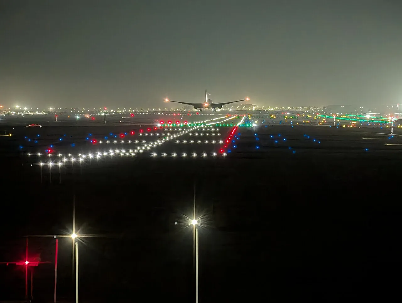 Cathay Pacific Boeing 777-300ER moments before touchdown at Runway 29R, IGI Airport.