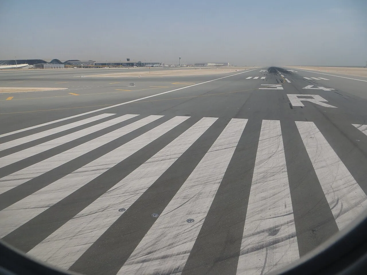 Runway 34R at Hamad International Airport, Doha, Qatar. Viewed from a Qatar Airways Boeing 777-300ER