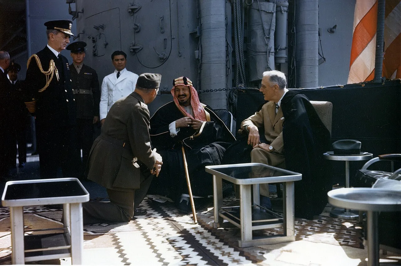 The U.S. President Franklin D. Roosevelt meets with King Ibn Saud , of Saudi Arabia , on board the U.S. Navy heavy cruiser USS Quincy (CA-71) in the Great Bitter Lake, Egypt, on 14 February 1945. The King is speaking to 