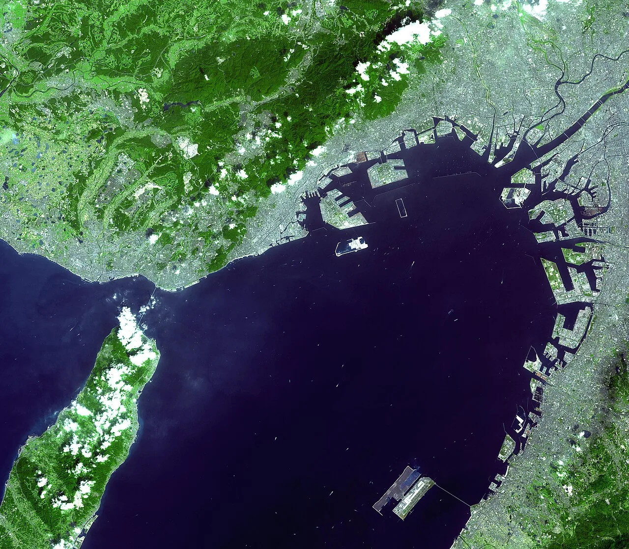 Satellite image of Osaka Bay in Japan . This shows the airport on its artificial island in the bay. For a closeup of the island itself, see Image:Kansai closeup.jpg According to the original name of the file, the photo w