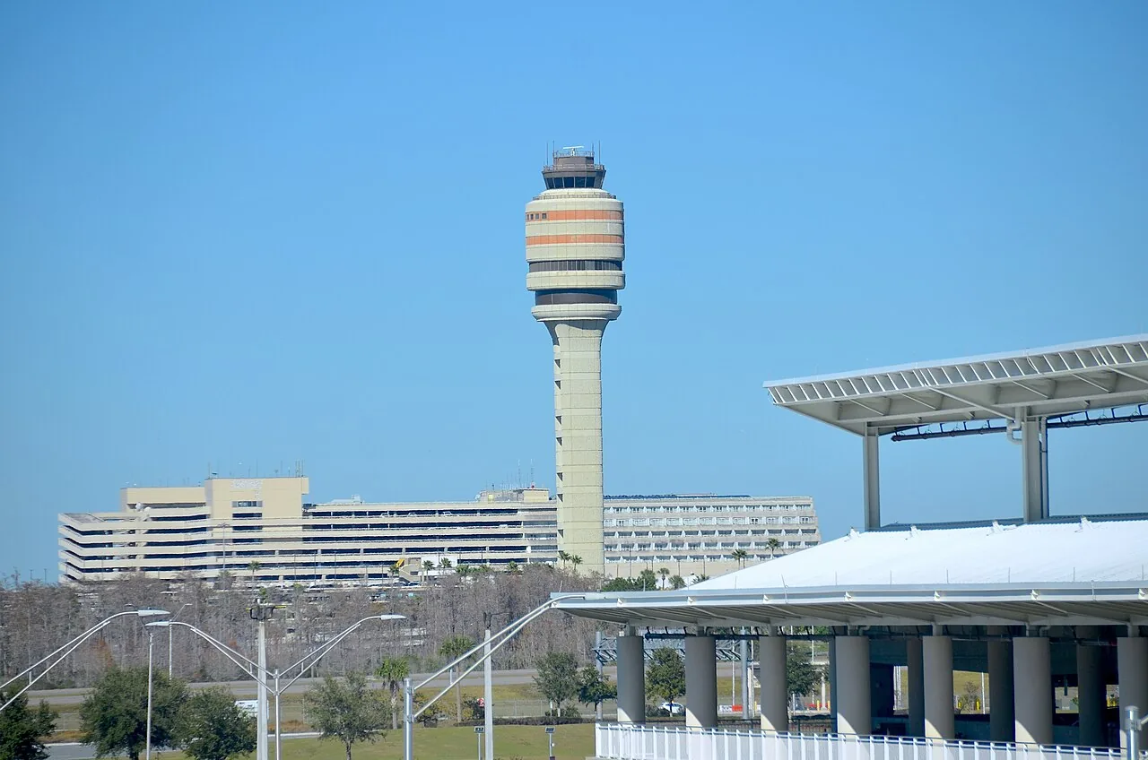 Air traffic control tower and buildings at Terminal A and B at Orlando International Airport