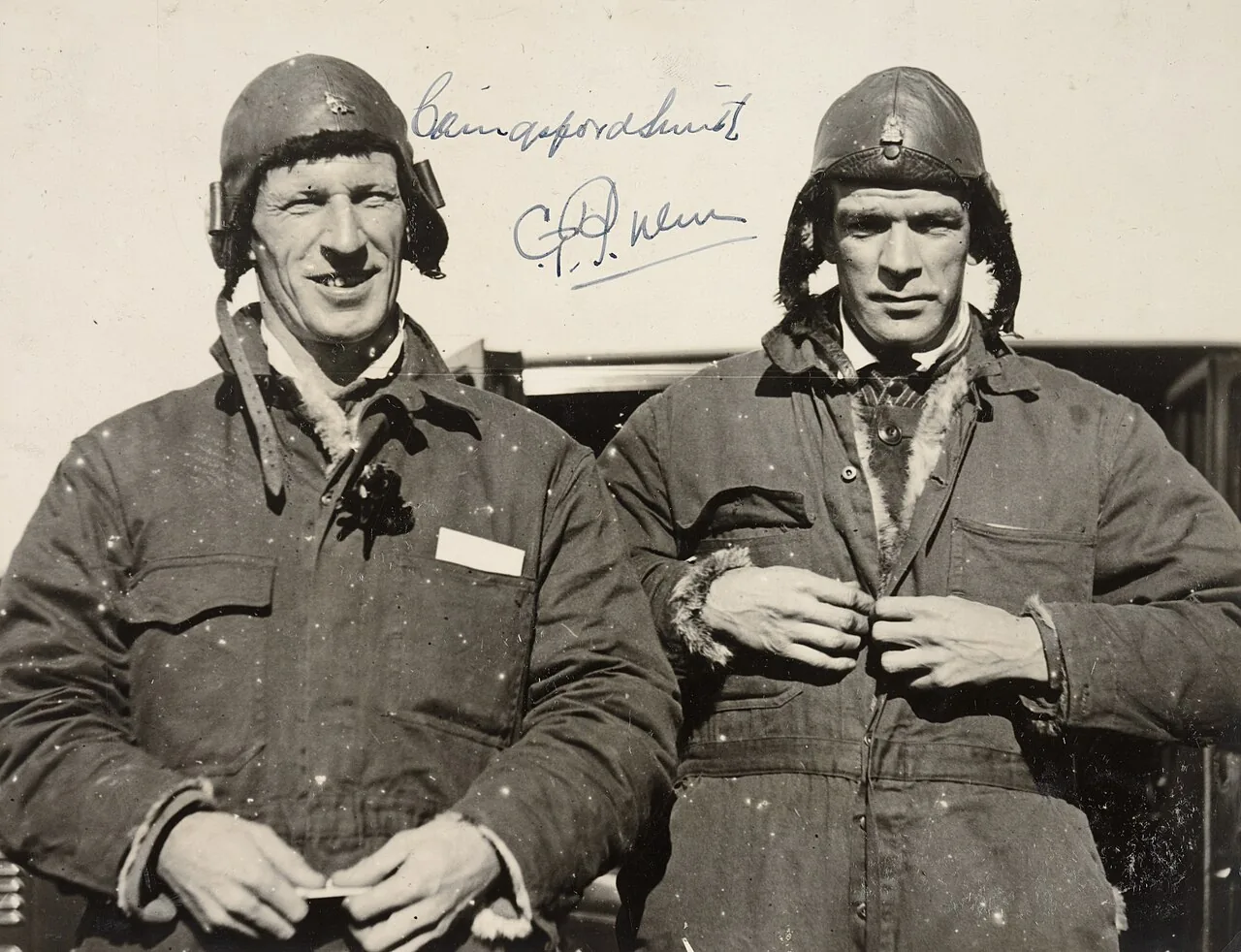 Charles Kingsford-Smith and Charles Ulm, on landing after the first trans-Pacific flight, Mascot, 10 June 1928, by unknown, vintage gelatin silver print, State Library of New South Wales, P1/1825