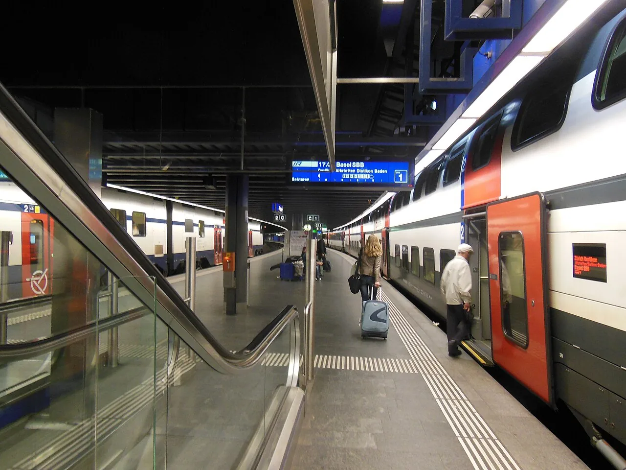 The underground platforms at Zurich Airport railway station, with double-deck S-Bahn (left) and InterRegio (right) trains. For more information, please see the Wikipedia article Zurich Airport railway station .